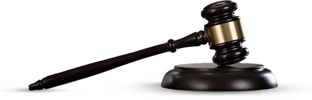 A gavel sitting on top of a table.